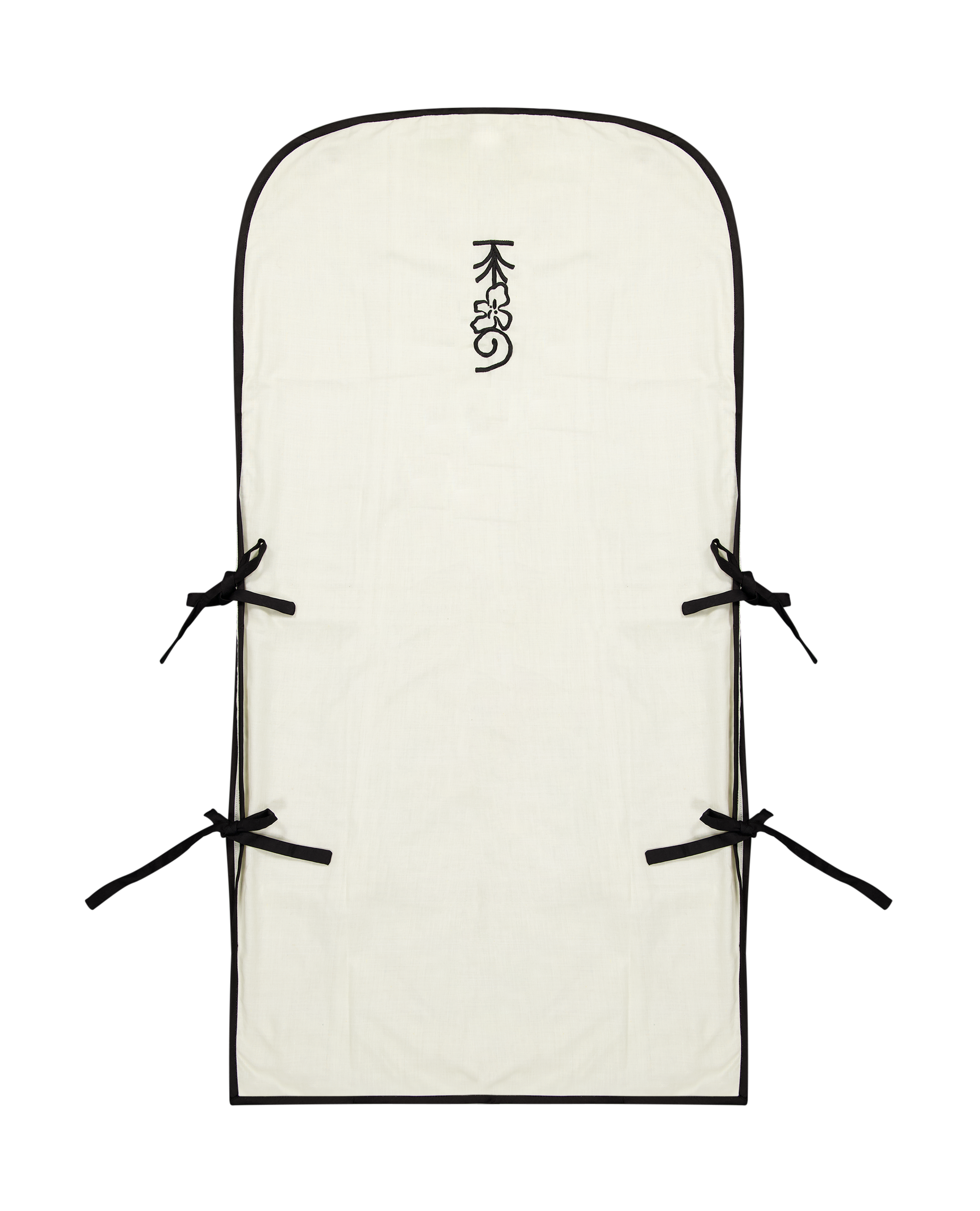 Luxury cotton garment bag by MAATHI Paris in raw ivory cotton with black piping, embroidered logo, and fabric tie closures for elegant garment storage and travel.