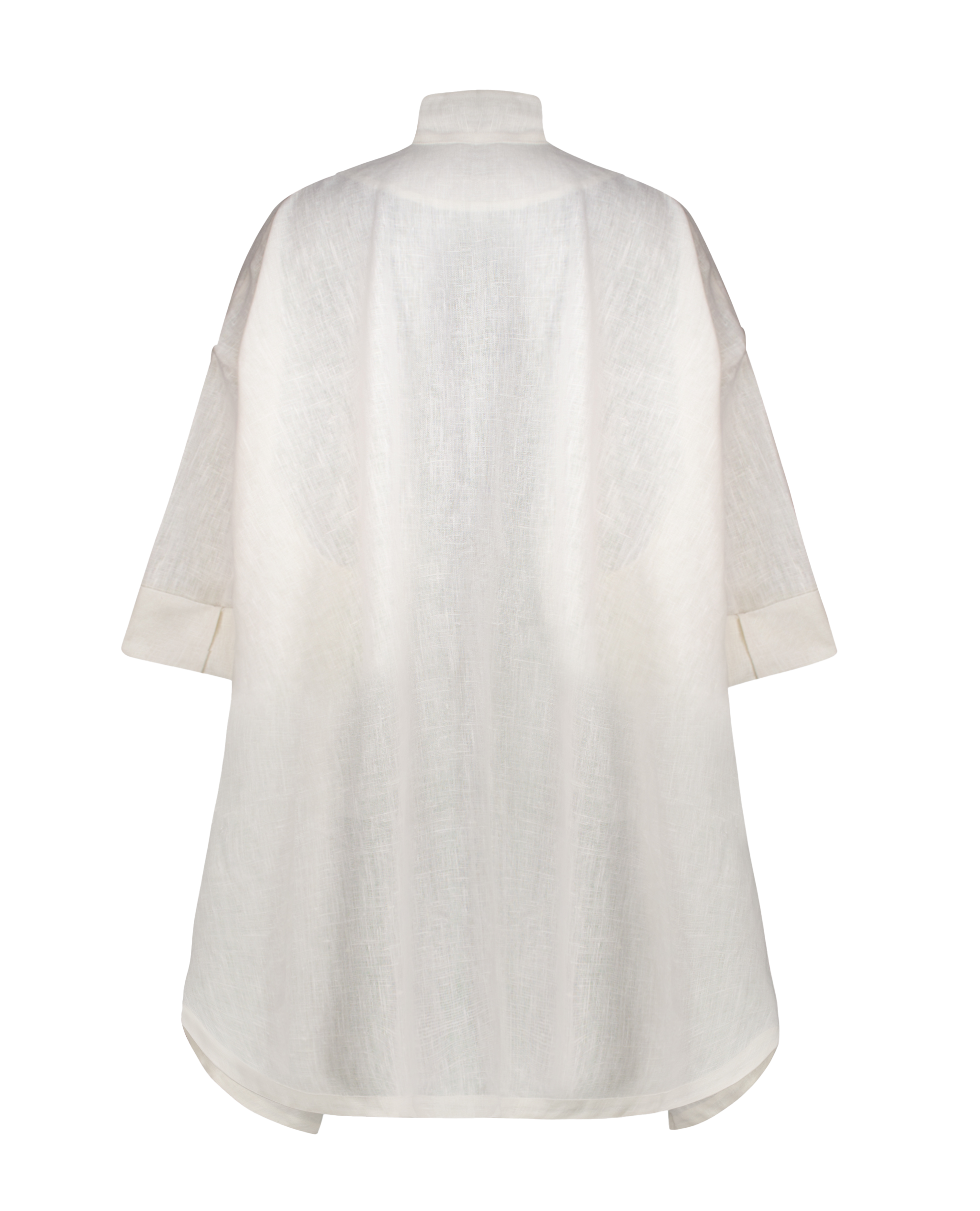 Back view of the Souffle Babydoll Top in Shell White, featuring its fluid drape and open silhouette.